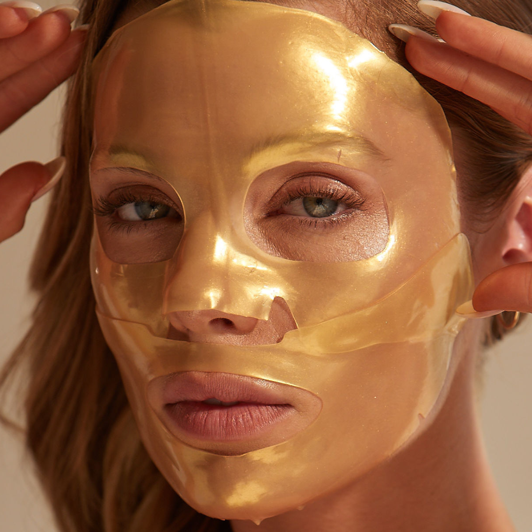 Model wearing CSM Golden Aura gold hydrogel face mask