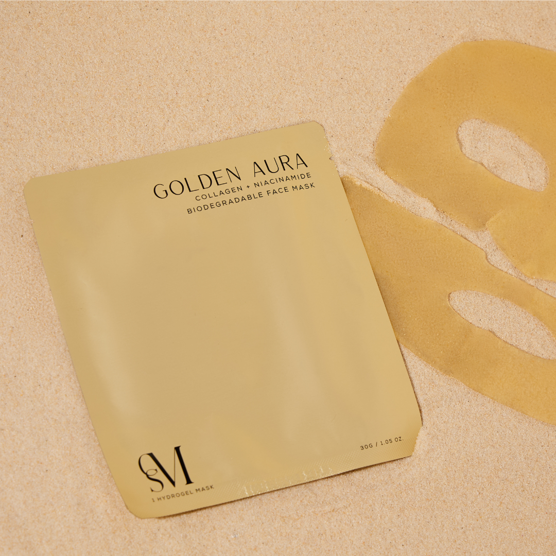 CSM Golden Aura face mask box and sheet flatlay