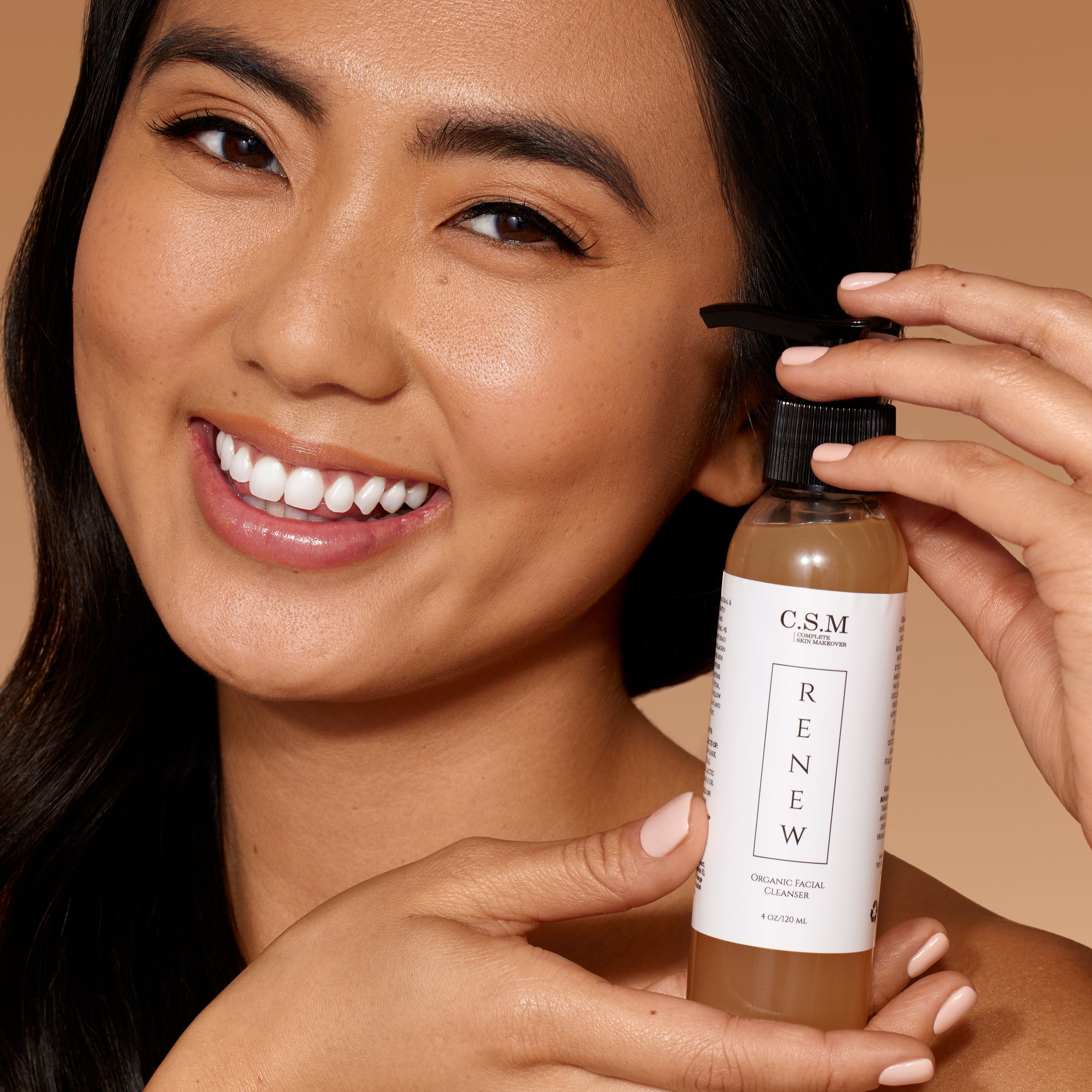 RENEW cleanser being applied to skin